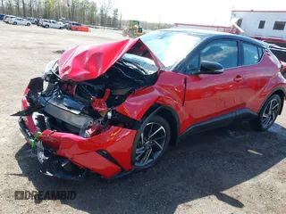 2021 Toyota C-HR LE with VIN NMTKHMBX9MR134669, listed as a IAAI auction lot 41982475 with 11,572 mi miles. Bid and sale history available at carsss.com. Image 2.