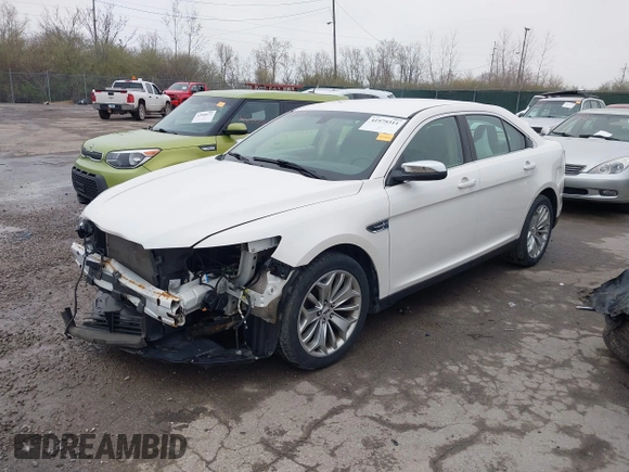 2015 Ford Taurus Limited with VIN 1FAHP2F85FG117635, listed as a IAAI auction lot 41979311 with 104,314 mi miles. Bid and sale history available at carsss.com. Image 2.