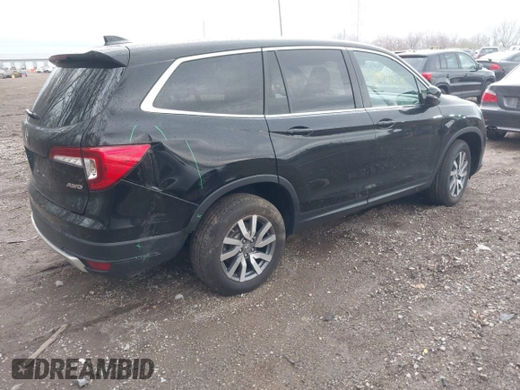 2019 Honda Pilot EX-L with VIN 5FNYF6H55KB071767, listed as a IAAI auction lot 41941696 with 66,844 mi miles and . Bid and sale history available at carsss.com. Image 4.