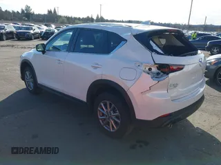 2023 Mazda CX-5 2.5 S Select Package with VIN JM3KFBBM9P0142478, listed as a IAAI auction lot 41724596 with 9,518 mi miles. Bid and sale history available at carsss.com. Image 3.
