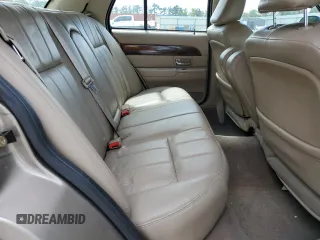 2005 Mercury Grand Marquis GS z VIN 2MEFM74W05X673934, wystawiony jako Copart lot #52608785 z przebiegiem 170 558 mil mil oraz Szkody całkowita. Historia ofert i sprzedaży dostępna na DreamBid. Obrazek 10.