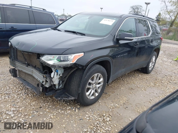 2021 Chevrolet Traverse LT with VIN 1GNERHKW0MJ218426, listed as a IAAI auction lot 42178273 with 76,545 mi miles and . Bid and sale history available at DreamBid. Image 2.