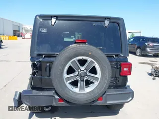 2023 Jeep Wrangler Sahara with VIN 1C4HJXEN5PW508257, listed as a IAAI auction lot 42007569 with 34,990 mi miles and . Bid and sale history available at DreamBid. Image 16.