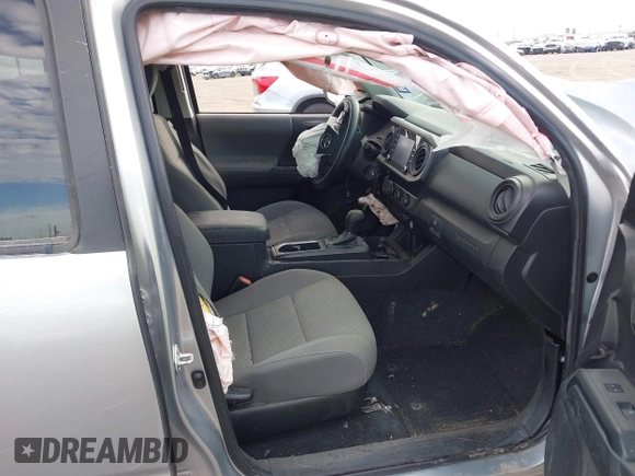 2022 Toyota Tacoma SR with VIN 3TYAX5GN8NT060017, listed as a IAAI auction lot 41504710 with 55,317 mi miles and . Bid and sale history available at DreamBid. Image 5.