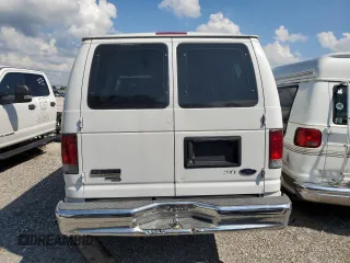 2009 Ford Econoline Passenger XL with VIN 1FBSS31L99DA06824, listed as a Copart auction lot 73740824 with 147,528 mi miles and Salvage title. Bid and sale history available at DreamBid. Image 6.