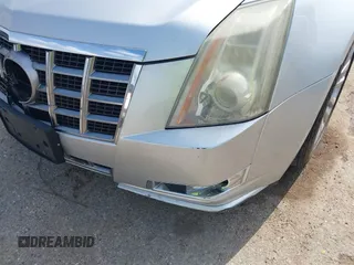 2012 Cadillac CTS Performance z VIN 1G6DJ5E37C0145221, wystawiony jako IAAI lot #42111935 z przebiegiem 82 103 mil mil oraz . Historia ofert i sprzedaży dostępna na DreamBid. Obrazek 13.
