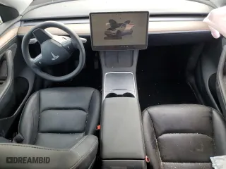 2022 Tesla Model Y Long Range with VIN 7SAYGAEE1NF540574, listed as a Copart auction lot 49001125 with 40,806 mi miles and Salvage Title. Bid and sale history available at carsss.com. Image 8.