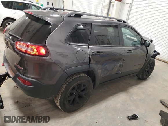 2018 Jeep Cherokee Trailhawk with VIN 1C4PJMBB8JD599791, listed as a Copart auction lot 86650054 with 66,360 mi miles and Non Repairable. Bid and sale history available at DreamBid. Image 3.