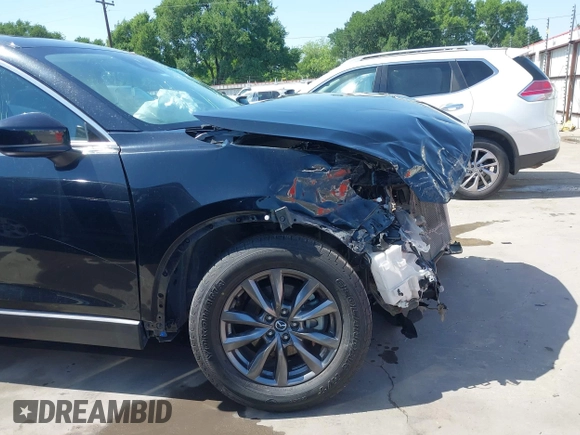 2023 Mazda CX-9 Touring with VIN JM3TCBCY2P0651679, listed as a IAAI auction lot 42002920 with 67,791 mi miles and . Bid and sale history available at DreamBid. Image 18.