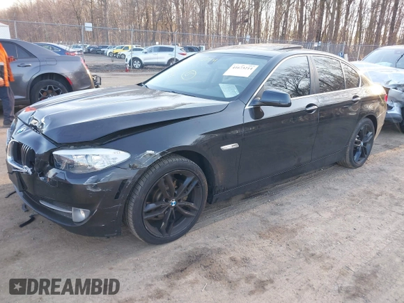 2013 BMW 5 Series 528i xDrive with VIN WBAXH5C58DD107515, listed as a IAAI auction lot 41673214 with 115,726 mi miles. Bid and sale history available at carsss.com. Image 2.