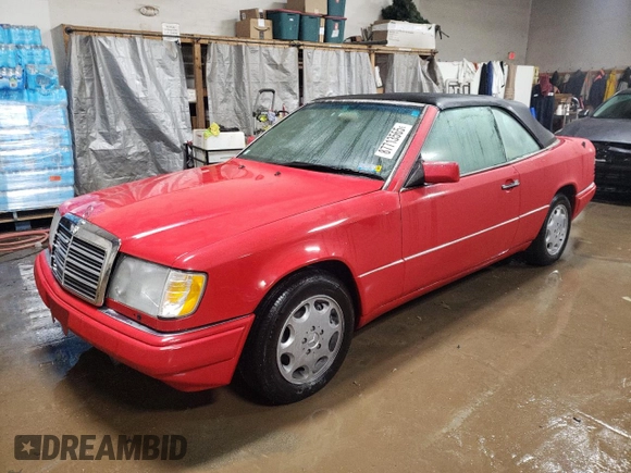 1994 Mercedes-Benz E 320 with VIN WDBEA66E8RC044069, listed as a Copart auction lot 87713565 with 69,061 mi miles and Salvage Title. Bid and sale history available at DreamBid. Image 1.