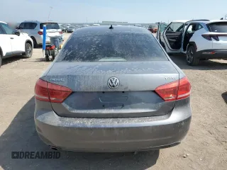 2014 Volkswagen Passat SE z VIN 1VWBN7A30EC078471, wystawiony jako Copart lot #60243135 z przebiegiem 96 862 mil mil oraz Szkoda całkowita • Salvage title. Historia ofert i sprzedaży dostępna na DreamBid. Obrazek 6.