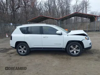 2016 Jeep Compass Latitude with VIN 1C4NJDEBXGD737018, listed as a IAAI auction lot 41800071 with 158,006 mi miles. Bid and sale history available at carsss.com. Image 13.