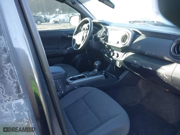 2019 Toyota Tacoma 4WD SR5 with VIN 3TMDZ5BN5KM078383, listed as a IAAI auction lot 38651345 with 50,363 mi miles. Bid and sale history available at carsss.com. Image 5.