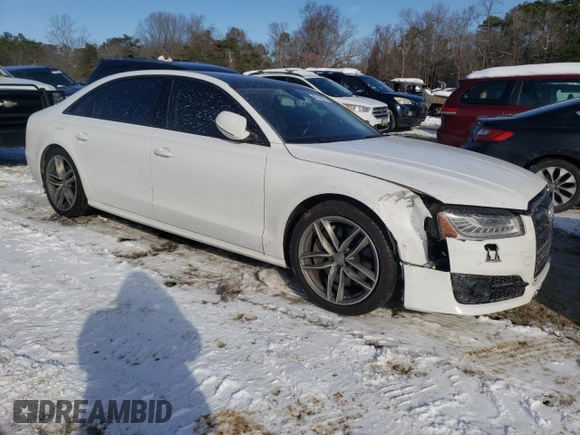 2017 Audi A8 Sport with VIN WAU43AFD1HN010007, listed as a Copart auction lot 86242694 with 68,612 mi miles and Salvage Title. Bid and sale history available at DreamBid. Image 4.