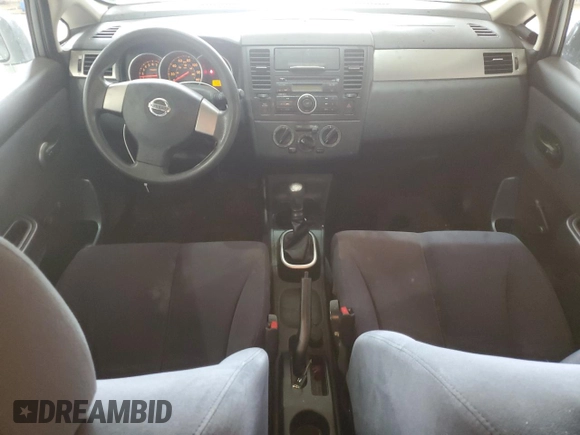 2009 Nissan Versa S with VIN 3N1BC13E59L499698, listed as a Copart auction lot 58242235 with 169,239 mi miles and Clean title. Bid and sale history available at DreamBid. Image 8.