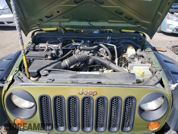 2008 Jeep Wrangler Unlimited X with VIN 1J4GA39118L528479, listed as a Copart auction lot 50953825 with 171,156 mi miles and Salvage Title. Bid and sale history available at carsss.com. Image 12.