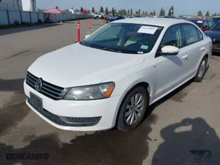 2014 Volkswagen Passat Wolfsburg Ed with VIN 1VWAT7A30EC097331, listed as a IAAI auction lot 41762061 with 173,351 mi miles. Bid and sale history available at carsss.com. Image 2.