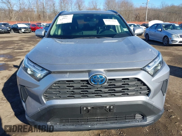 2023 Toyota RAV4 Hybrid LE with VIN JTMMWRFV6PD186024, listed as a IAAI auction lot 41417213 with 9,217 mi miles. Bid and sale history available at carsss.com. Image 12.