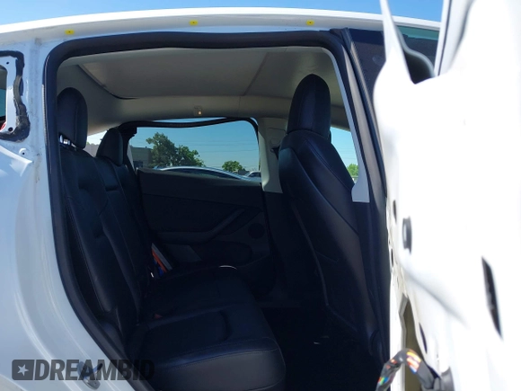2022 Tesla Model Y Long Range with VIN 7SAYGDEE1NF364241, listed as a IAAI auction lot 42190272 with 54,878 mi miles and . Bid and sale history available at DreamBid. Image 8.