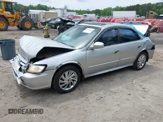 2002 Honda Accord SE z VIN 1HGCG56792A109226, wystawiony jako IAAI lot #42155995 z przebiegiem 238 789 mil mil oraz . Historia ofert i sprzedaży dostępna na DreamBid. Obrazek 2.