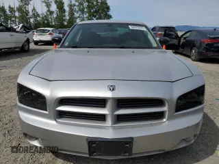 2009 Dodge Charger SE z VIN 2B3KA43D89H613585, wystawiony jako Copart lot #56076215 z przebiegiem 174 911 mil mil oraz Czysty tytuł • Clean title. Historia ofert i sprzedaży dostępna na DreamBid. Obrazek 5.