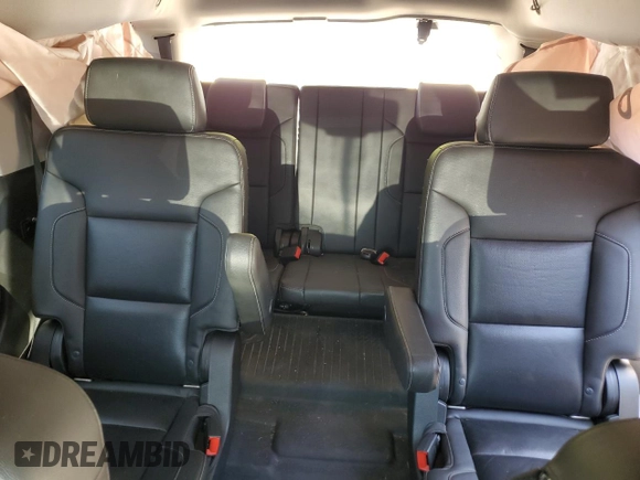 2018 Chevrolet Tahoe Premier with VIN 1GNSKCKC1JR133625, listed as a Copart auction lot 54900974 with 130,921 mi miles and Salvage title. Bid and sale history available at DreamBid. Image 10.