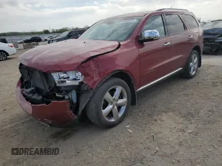 2013 Dodge Durango Citadel z VIN 1C4SDJET6DC563631, wystawiony jako Copart lot #53468255 z przebiegiem 221 638 mil mil oraz Szkoda całkowita • Salvage title. Historia ofert i sprzedaży dostępna na DreamBid. Obrazek 1.