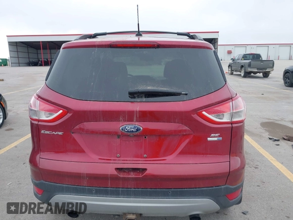 2014 Ford Escape SE with VIN 1FMCU9G90EUD89356, listed as a IAAI auction lot 41841229 with 148,997 mi miles and . Bid and sale history available at carsss.com. Image 16.