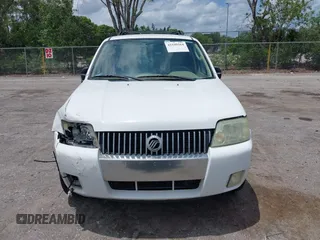 2006 Mercury Mariner Luxury with VIN 4M2YU56116KJ14472, listed as a IAAI auction lot 42349564 with 96,221 mi miles and . Bid and sale history available at DreamBid. Image 12.