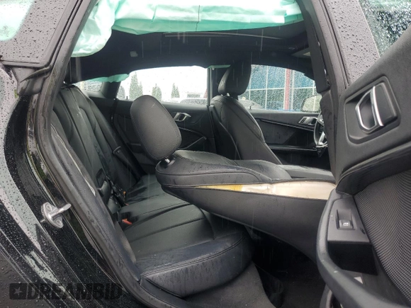 2021 BMW 2 Series 228i xDrive with VIN WBA73AK07M7H58410, listed as a Copart auction lot 55775995 with 76,921 mi miles and Salvage title. Bid and sale history available at DreamBid. Image 10.