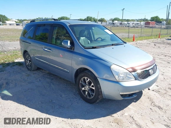 2014 Kia Sedona EX with VIN KNDMH4C70E6553732, listed as a IAAI auction lot 41812283 with 676,894 mi miles. Bid and sale history available at carsss.com. Image 1.