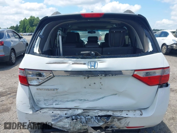 2011 Honda Odyssey EX-L with VIN 5FNRL5H6XBB002461, listed as a IAAI auction lot 42662720 with 145,672 mi miles and . Bid and sale history available at DreamBid. Image 6.