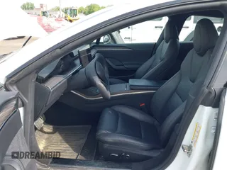 2022 Tesla Model S with VIN 5YJSA1E58NF467644, listed as a IAAI auction lot 42344403 with 52,628 mi miles and . Bid and sale history available at DreamBid. Image 5.