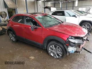 2023 Mazda CX-30 S Premium with VIN 3MVDMBDM0PM527234, listed as a Copart auction lot 43534975 with 77,240 mi miles and Non Repairable. Bid and sale history available at DreamBid. Image 4.
