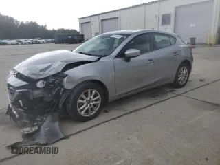 2015 Mazda 3 i Touring with VIN 3MZBM1L72FM202319, listed as a Copart auction lot 60164035 with 98,975 mi miles and Salvage title. Bid and sale history available at DreamBid. Image 1.