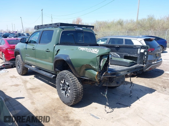 2021 Toyota Tacoma 4WD SR with VIN 3TMCZ5ANXMM382874, listed as a IAAI auction lot 41965388 with 62,178 mi miles. Bid and sale history available at carsss.com. Image 3.