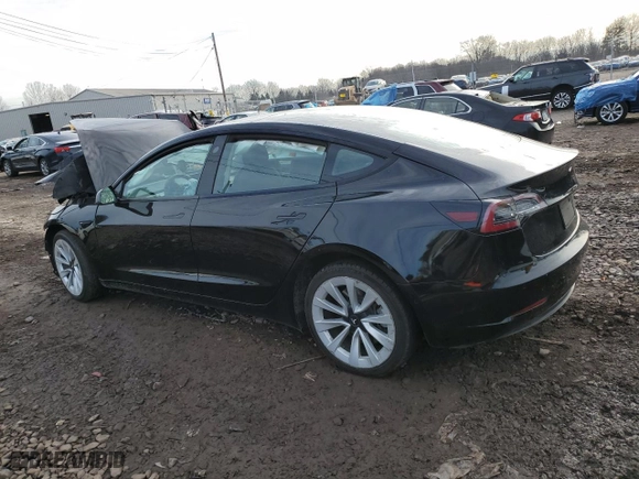 2022 Tesla Model 3 with VIN 5YJ3E1EA3NF288398, listed as a Copart auction lot 46535375 with 89,968 mi miles and Salvage Title. Bid and sale history available at carsss.com. Image 2.