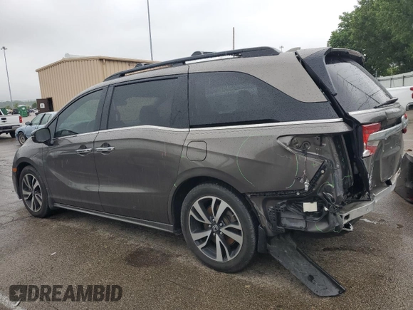 2018 Honda Odyssey Elite z VIN 5FNRL6H94JB107589, wystawiony jako Copart lot #58347385 z przebiegiem 98 761 mil mil oraz Szkoda całkowita • Salvage title. Historia ofert i sprzedaży dostępna na DreamBid. Obrazek 2.