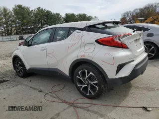 2019 Toyota C-HR XLE z VIN NMTKHMBX7KR073500, wystawiony jako Copart lot #53596395 z przebiegiem 91 934 mil mil oraz Szkoda całkowita • Salvage title. Historia ofert i sprzedaży dostępna na DreamBid. Obrazek 2.