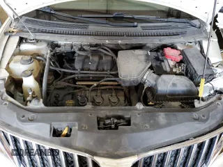 2013 Lincoln MKX z VIN 2LMDJ6JKXDBL19895, wystawiony jako Copart lot #51623655 z przebiegiem 245 542 mil mil oraz Szkoda całkowita • Salvage title. Historia ofert i sprzedaży dostępna na DreamBid. Obrazek 11.