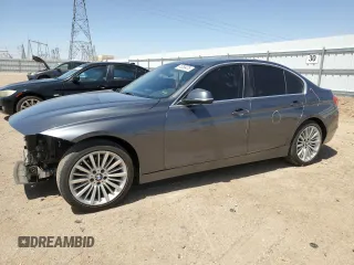 2013 BMW 3 Series 328i with VIN WBA3C1C56DF437440, listed as a Copart auction lot 61389475 with 122,736 mi miles and Salvage title. Bid and sale history available at DreamBid. Image 1.