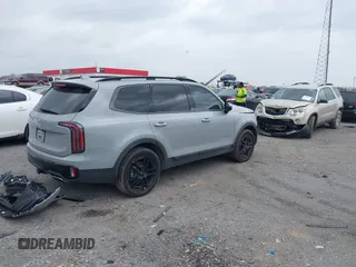 2024 Kia Telluride EX X-Line z VIN 5XYP3DGC2RG496309, wystawiony jako IAAI lot #41804549 z przebiegiem 16 785 mil mil oraz . Historia ofert i sprzedaży dostępna na DreamBid. Obrazek 4.