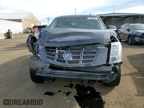 2010 Cadillac Escalade z VIN 1GYUKAEF8AR254884, wystawiony jako Copart lot #44844935 z przebiegiem 130 269 mil mil oraz Szkody całkowita. Historia ofert i sprzedaży dostępna na DreamBid. Obrazek 11.