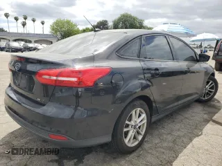2015 Ford Focus SE with VIN 1FADP3F20FL249872, listed as a Copart auction lot 53506885 with 97,078 mi miles and Salvage title. Bid and sale history available at DreamBid. Image 3.