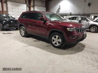 2018 Jeep Grand Cherokee Laredo E with VIN 1C4RJFAG9JC359284, listed as a IAAI auction lot 41032232 with 163,679 mi miles. Bid and sale history available at carsss.com. Image 1.