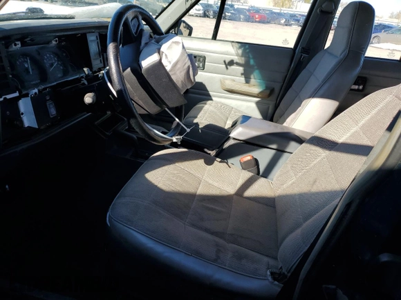 1996 Jeep Cherokee SE z VIN 1J4FJ28S6TL184205, wystawiony jako Copart lot #77558034 z przebiegiem 195 000 mil mil oraz Tytuł czysty. Historia ofert i sprzedaży dostępna na DreamBid. Obrazek 7.