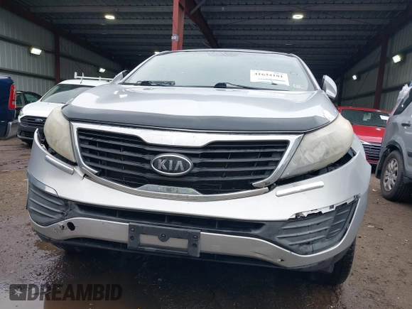 2012 Kia Sportage LX with VIN KNDPB3A27C7290386, listed as a IAAI auction lot 41634101 with 116,807 mi miles. Bid and sale history available at carsss.com. Image 6.