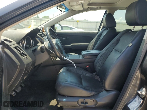 2014 Mazda CX-9 Touring with VIN JM3TB3CA6E0441708, listed as a Copart auction lot 61143785 with 173,562 mi miles and Salvage title. Bid and sale history available at DreamBid. Image 7.