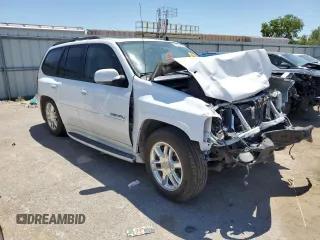2007 GMC Envoy Denali z VIN 1GKET63M072101556, wystawiony jako Copart lot #57820235 z przebiegiem Nie podano mil oraz Szkoda całkowita • Salvage title. Historia ofert i sprzedaży dostępna na DreamBid. Obrazek 4.